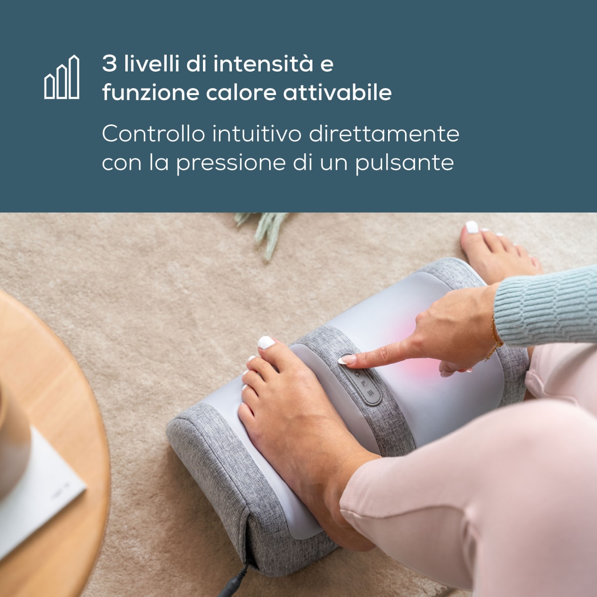 Dito preme il pulsante di Sanervol, luce calda – 3 livelli di intensità e funzione calore